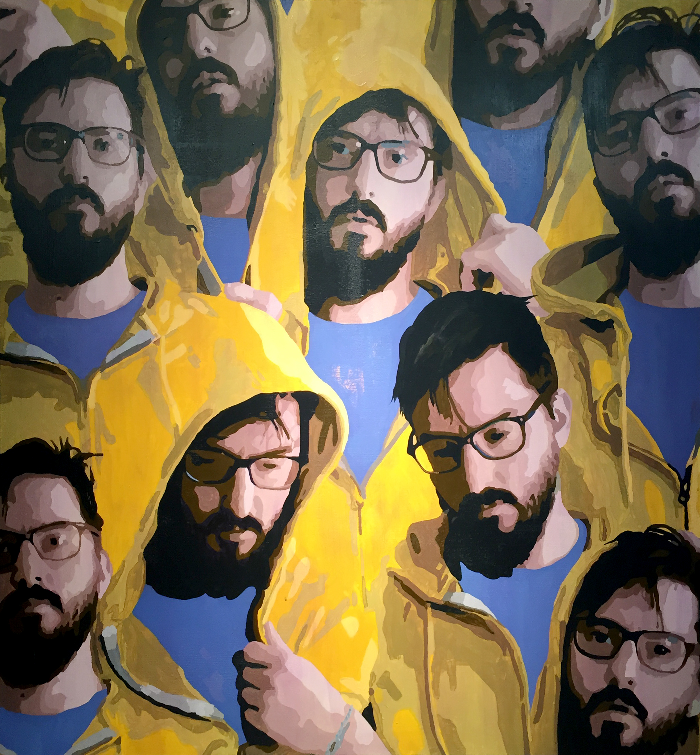 A collage of repeated bearded faces surrounds a central figure in a bright yellow hood, layered over blue, green, and ochre shapes.