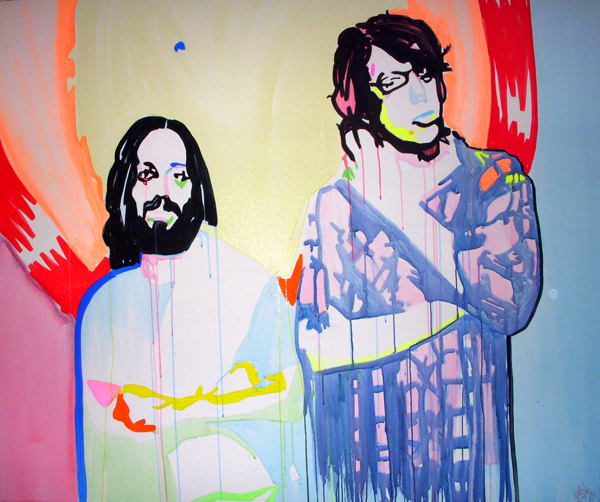 Two musicians stand side by side; a smaller bearded figure faces forward while a taller long-haired figure crosses his arms, amid red and yellow.