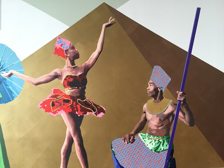 Mural detail of a dancer with one arm raised beside a seated drummer holding a tall purple drum, set against a gold triangle.