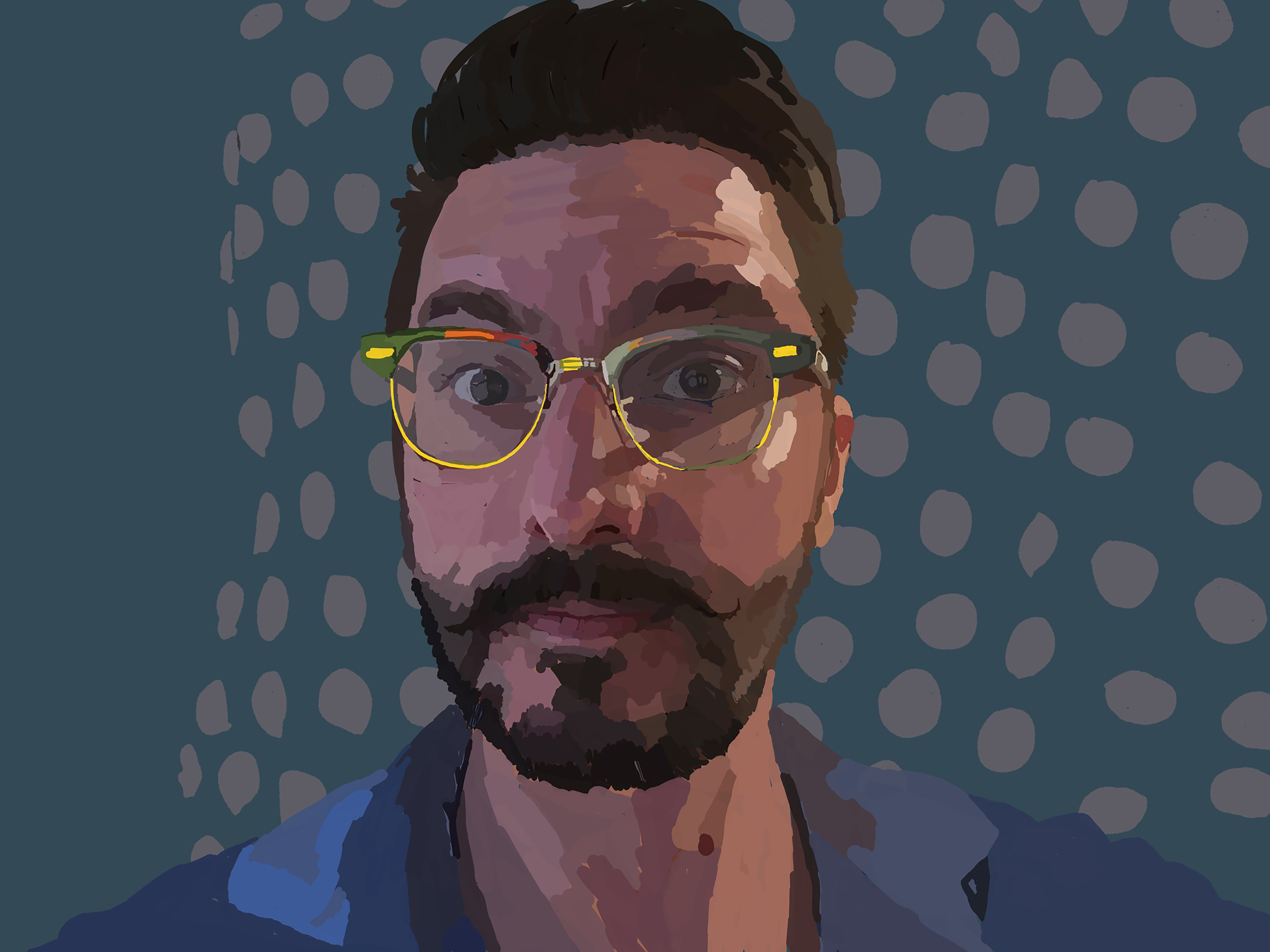 A frontal portrait of a bearded man in round yellow glasses and a blue shirt against a dark blue field of soft gray dots.